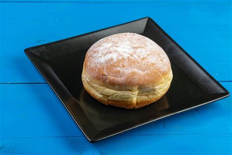 baked-paczki-polish-doughnuts-recipe-the-spruce image