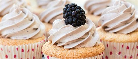 angel-food-cupcakes-with-blackberry-frosting image