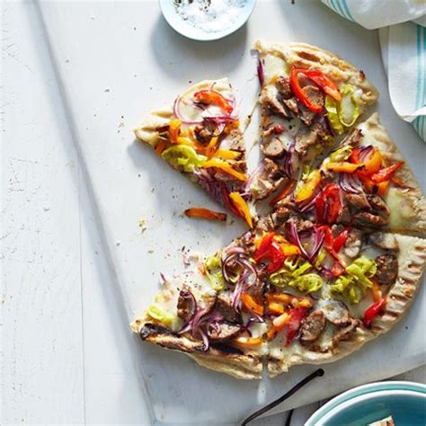 grilled-sausage-and-pepper-pizza-womansdaycom image