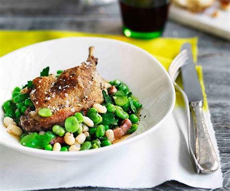 confit-duck-with-white-beans-speck-and-broad-beans image