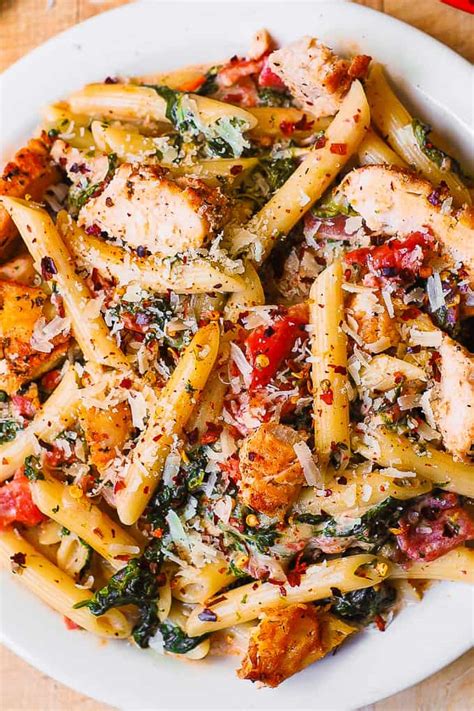 chicken-and-bacon-pasta-with-spinach-and-tomatoes image