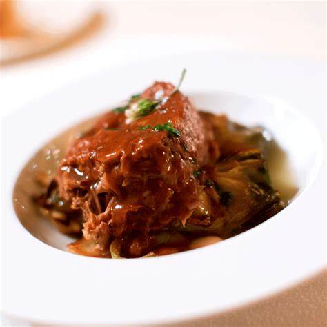slow-cooked-mediterranean-lamb-castle-in-the-mountains image