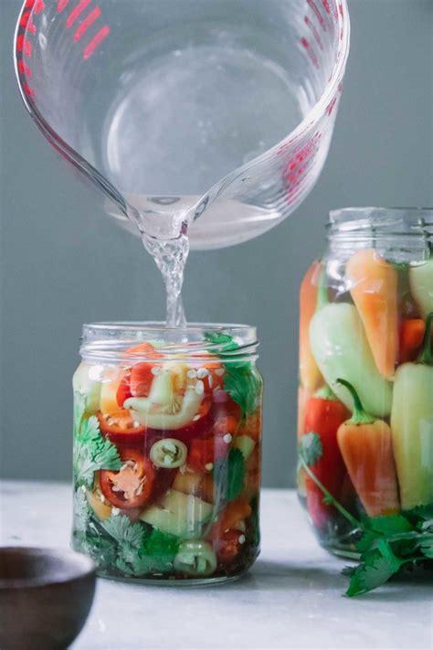 refrigerator-pickled-peppers-whole-and-sliced-fork image