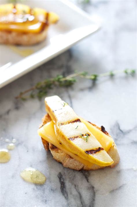 grilled-pear-and-gouda-crostini-with-honey-and-thyme image