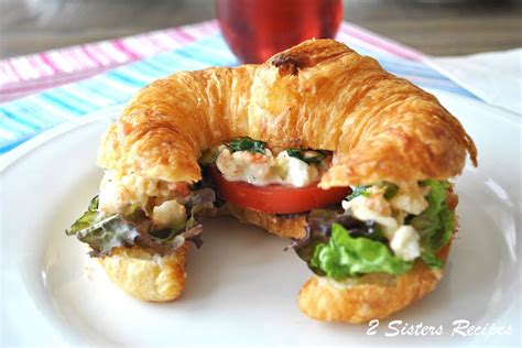 shrimp-salad-with-cajun-mayo-on-toasted-croissant image