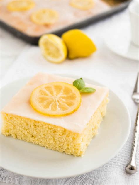 easy-lemon-sheet-cake-recipe-plated-cravings image