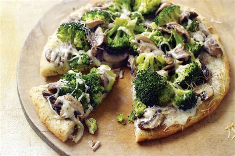 white-pizza-with-broccoli-and-mushrooms image