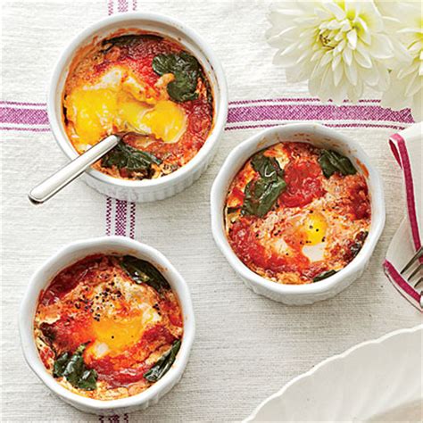 baked-eggs-with-spinach-and-tomatoes-recipe-myrecipes image