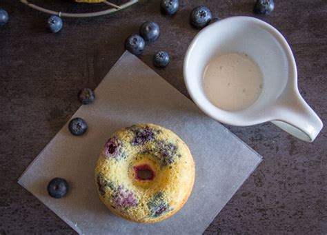 lemon-glazed-blueberry-baked-donuts-recipe-an image