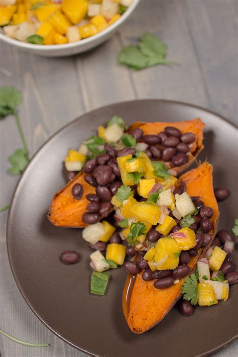 sweet-potatoes-with-black-beans-and-mango-salsa image