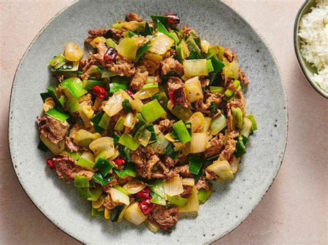 spicy-stir-fried-beef-with-leeks-and-onions image