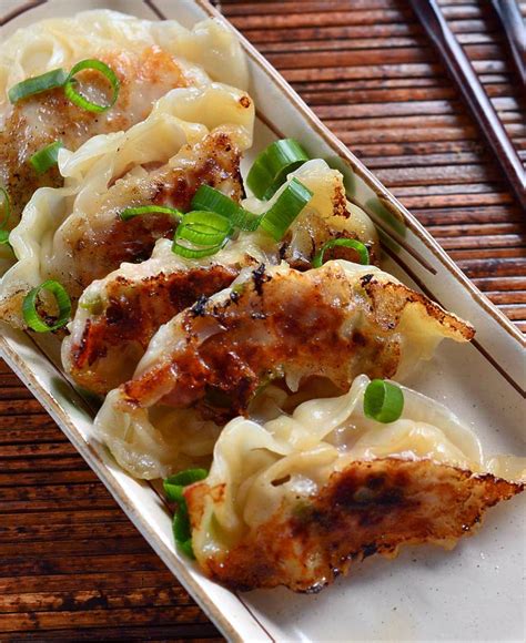 spicy-sesame-chicken-potstickers-lifes-ambrosia image