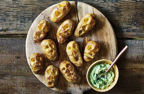 shrunken-potato-heads-with-slime-dip-recipe-tesco image