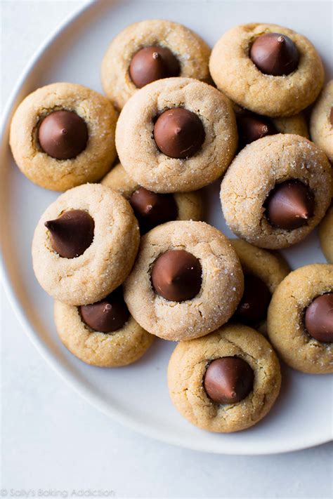 classic-peanut-butter-blossoms-sallys-baking-addiction image