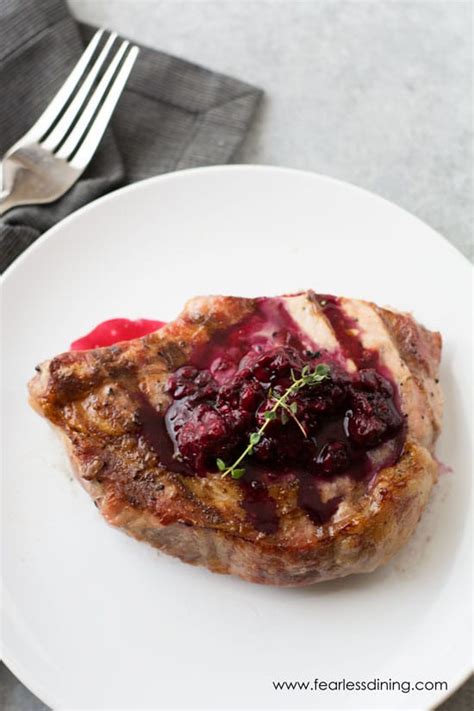 grilled-pork-chops-with-a-blackberry-thyme-sauce image