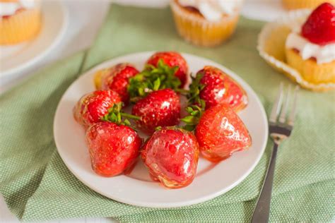 candy-shell-glazed-strawberries-recipe-the-spruce-eats image