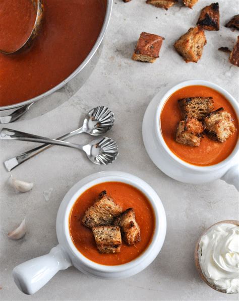 creamy-tomato-soup-with-brown-butter-garlic-croutons image