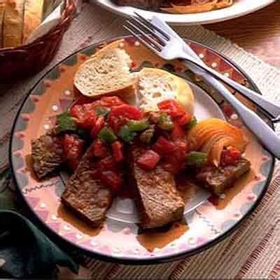 beef-roast-with-tomatoes-onions-peppers image