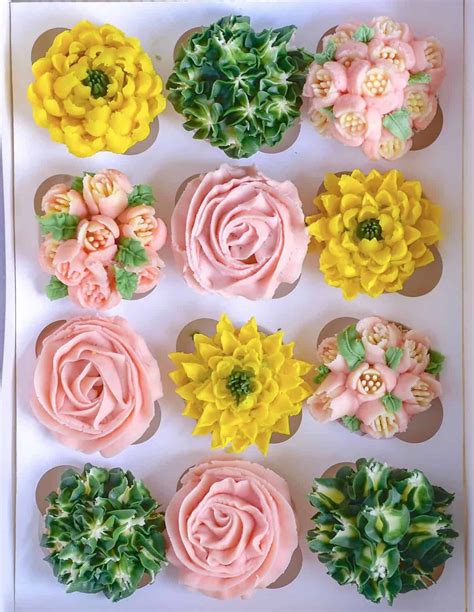 piped-floral-cupcakes-alphafoodie image