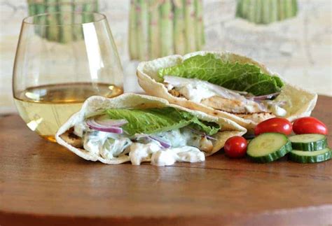 chicken-gyros-with-yogurt-dill-sauce-noshing-with-the image