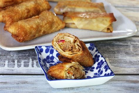 baked-or-fried-pulled-pork-egg-rolls-recipe-the-spruce image