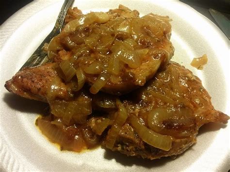 smothered-pork-chops-with-onions-gravy image