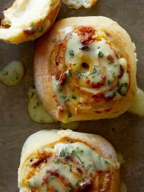 savory-breakfast-rolls-drizzled-with-bearnaise-spoon image