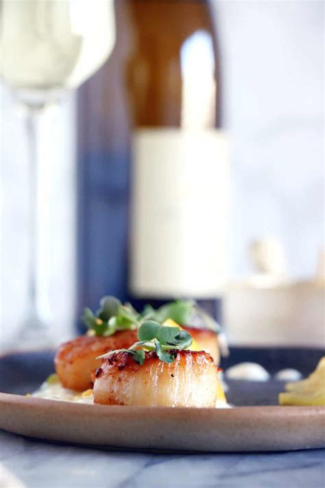 pan-seared-scallops-with-orange-ginger-sauce-dels-cooking-twist image