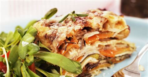 vegetarian-lasagna-with-tomato-salad-recipe-eat image