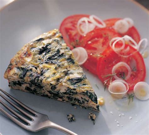 baked-greek-omelette-with-wild-greens-herbs-leeks image