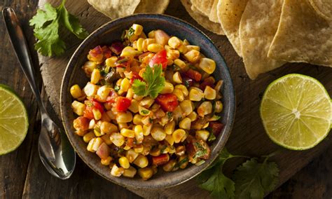 fire-roasted-poblano-and-corn-salsa-the-daily-meal image