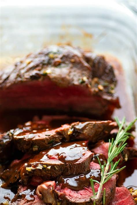 rosemary-garlic-butter-beef-tenderloin-with-red-wine image