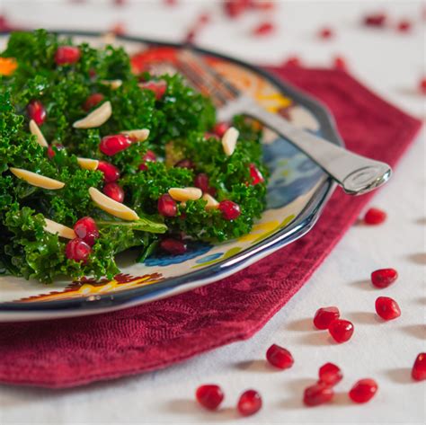 kale-salad-with-slivered-almonds-and-pomegranate image