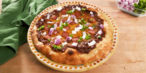 how-to-make-chili-cheese-dog-pizza-delish image
