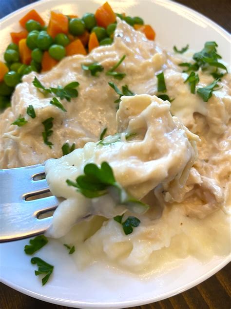chicken-and-gravy-over-mashed-potatoes image