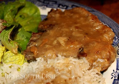 country-style-pork-chops-in-gravy-deep-south-dish image