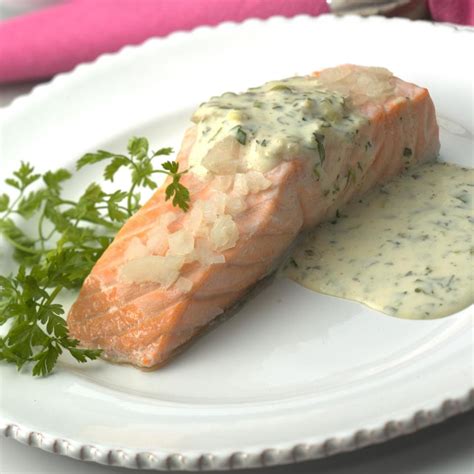 oven-poached-salmon-fillets-recipe-eatingwell image