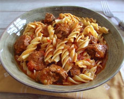 stewed-beef-with-pasta-recipe-food-from-portugal image