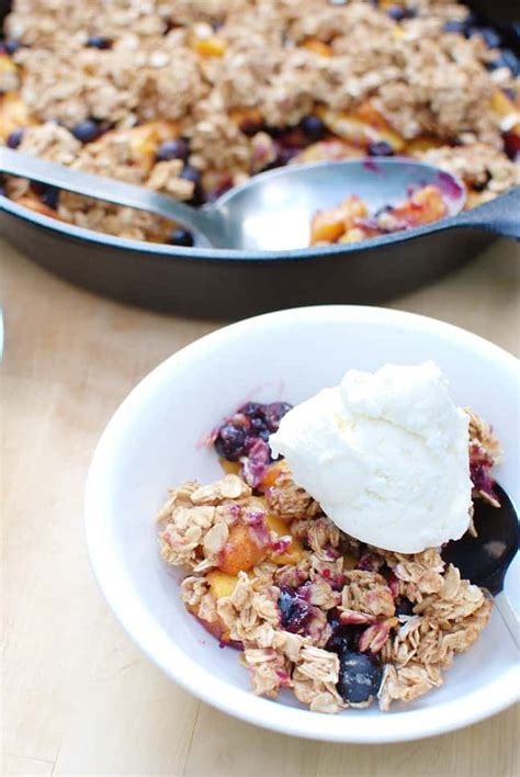 healthy-peach-blueberry-crisp-snacking-in-sneakers image