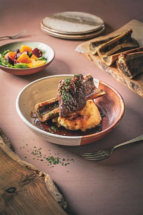 wine-braised-short-ribs-with-mashed-potatoes-and-bone image