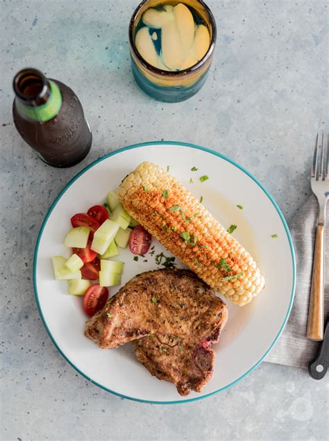 grilled-pork-chops-with-chile-lime-corn-and-a-grill-daddy image