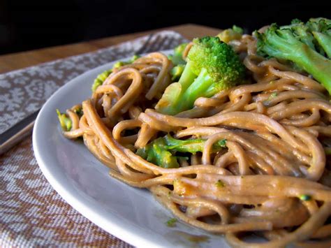 chinese-noodles-with-broccoli-in-peanut-sauce image