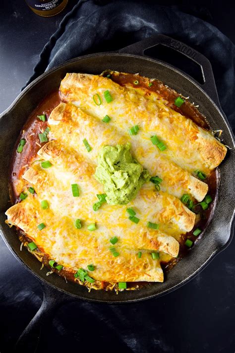 skillet-chicken-enchiladas-recipe-kitchen-swagger image