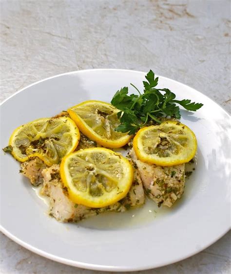 easy-baked-fish-with-lemon-herbs-simple-nourished image