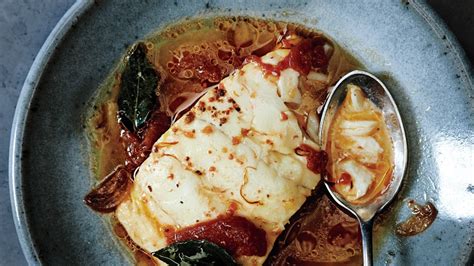 flaky-buttery-cod-swimming-happily-in-a-sea-of-tomato image