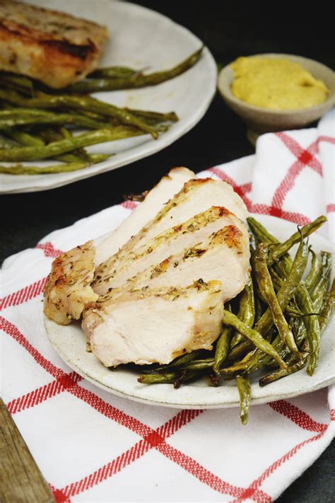 sheet-pan-pork-chops-recipe-with-green-beans-simply image