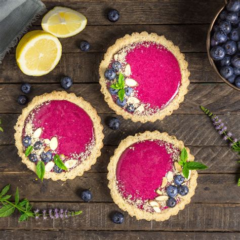 blueberry-lemon-curd-tartlets-with-almond-crust image
