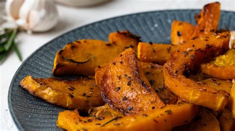 spiced-baked-butternut-squash-recipe-tasting-table image