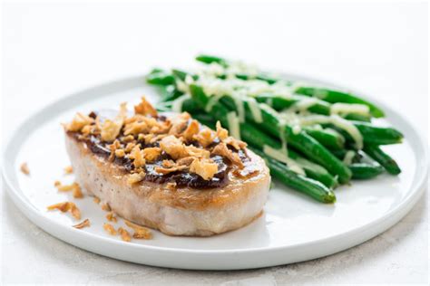 apple-butter-pork-chop-with-white-cheddar-green-beans image