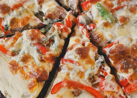 three-cheese-sausage-and-vegetable-pizza image